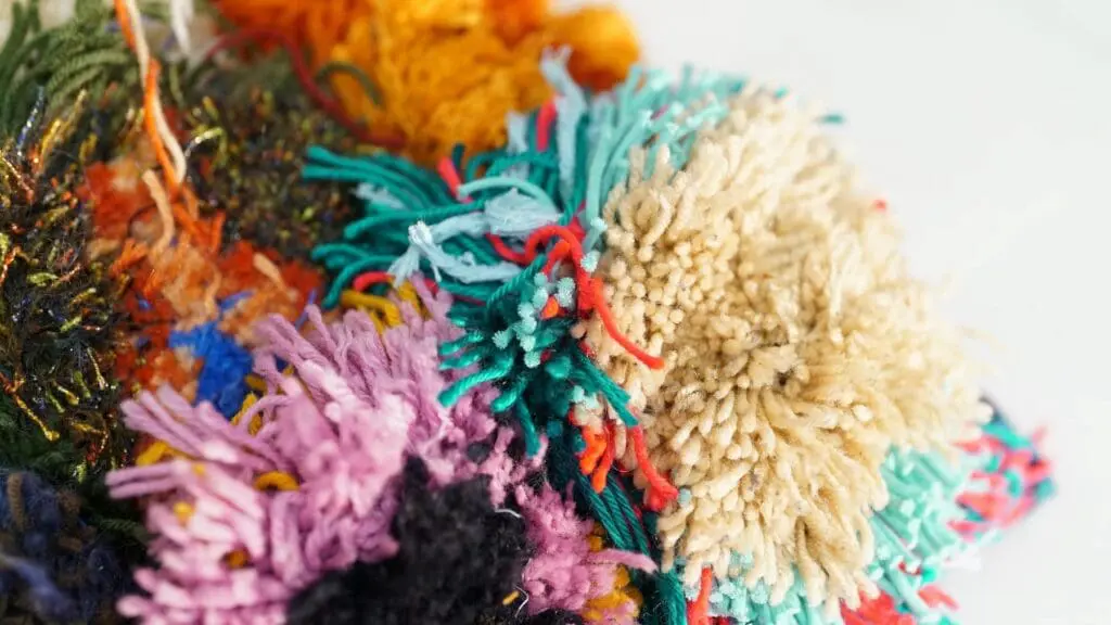 Sculpture made with yarns in a variety of colors and textures