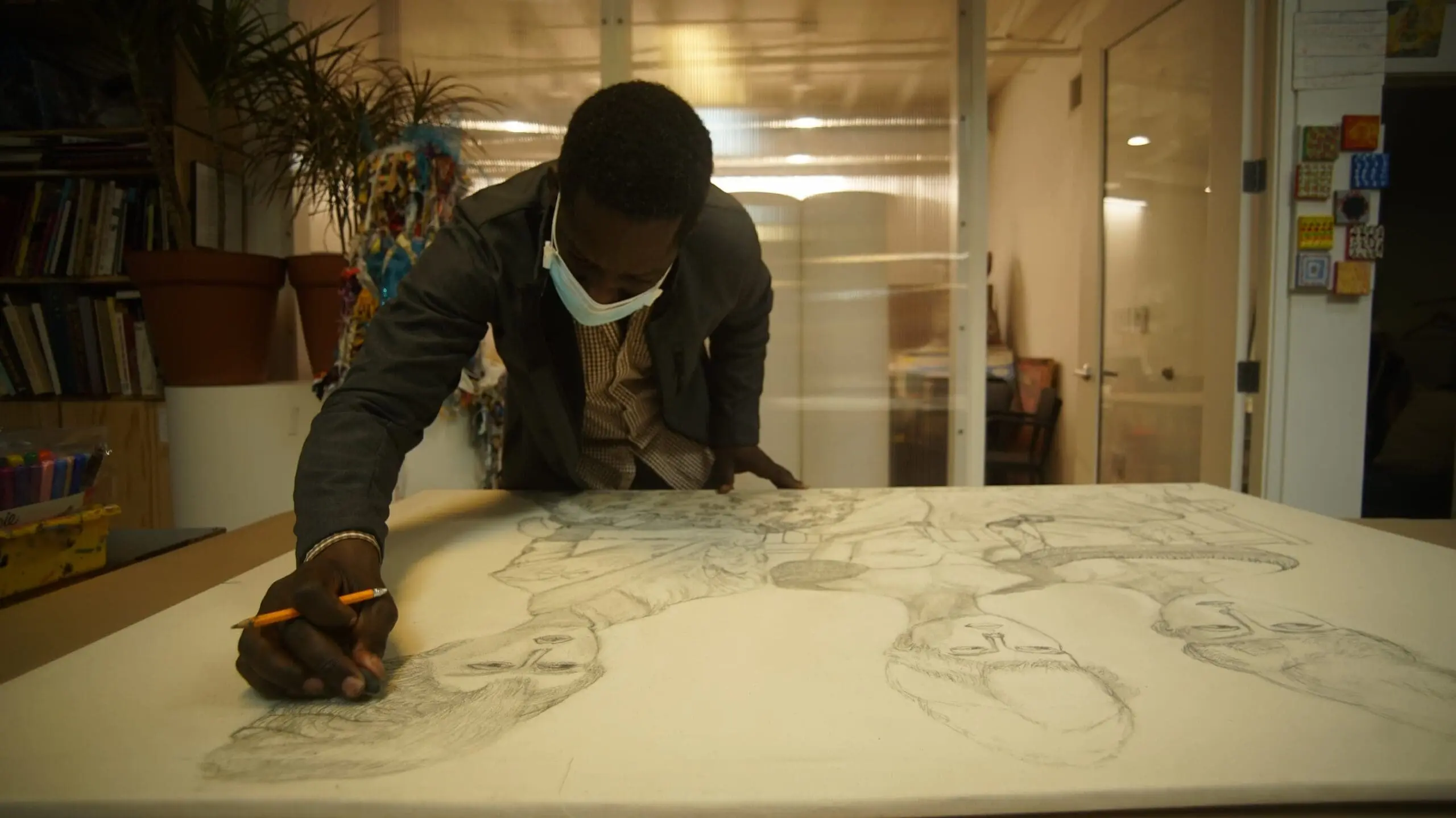 Artist drawing with pencil