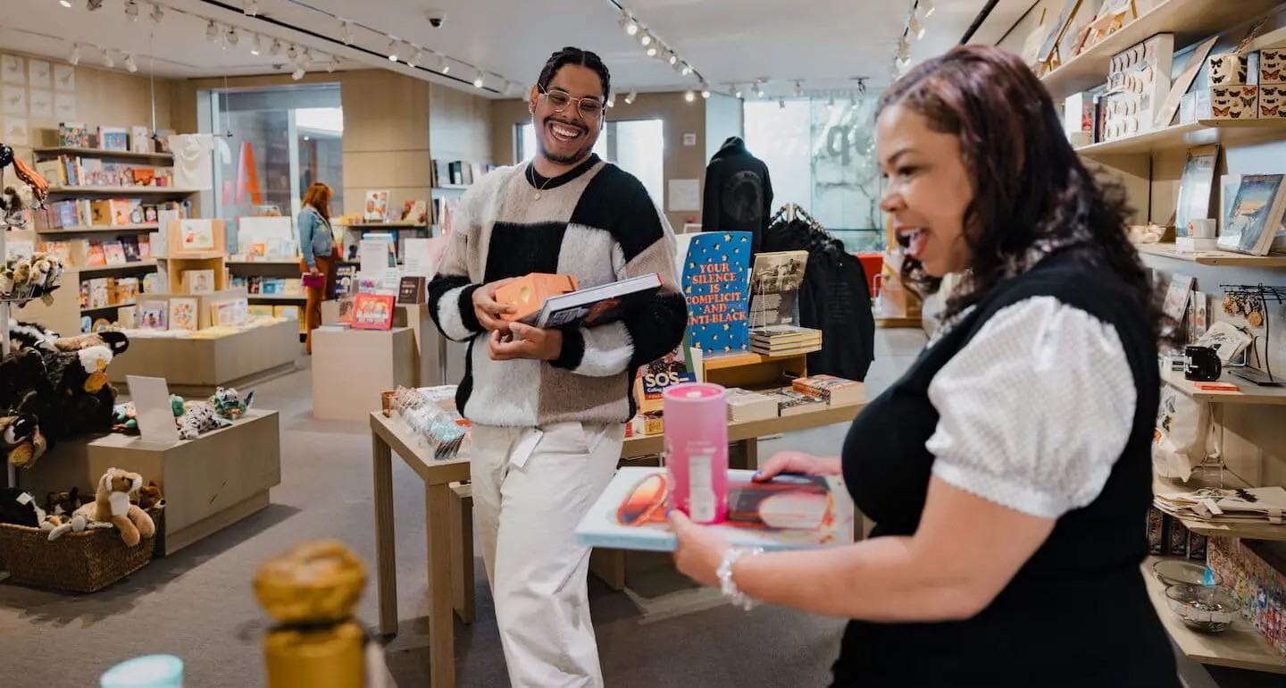Visitors getting excited at what they find at the OMCA shop