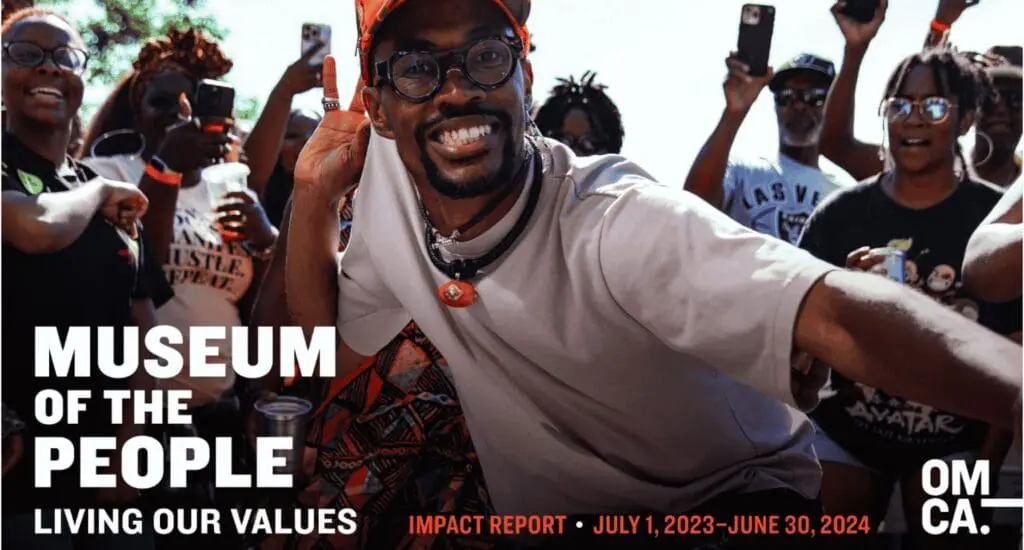 Returning to OMCA - image of two people eating at a picnic table