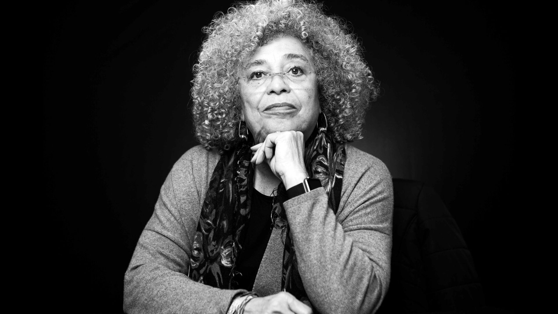 Black and white image of Angela Davis looking straight ahead