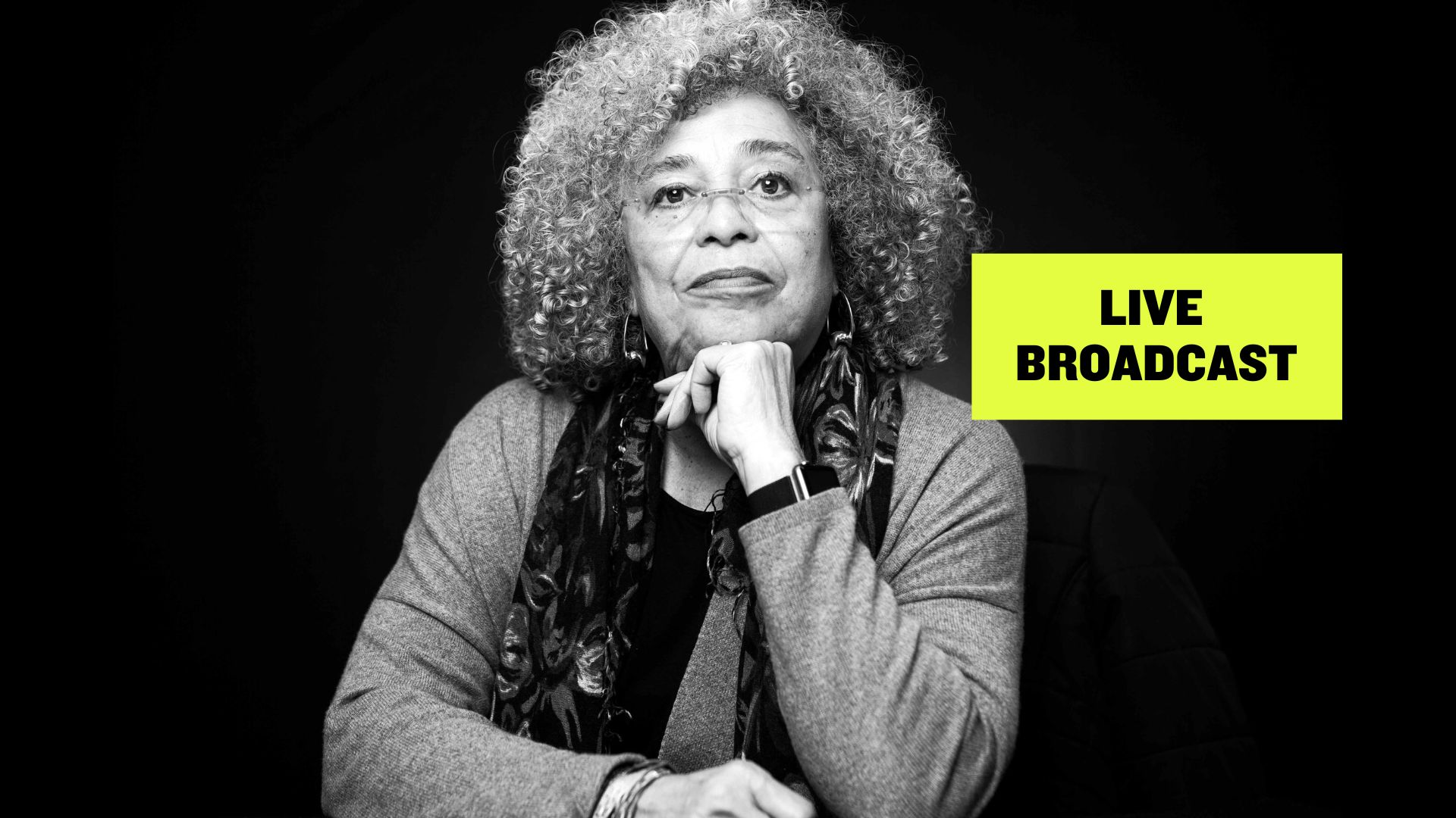 Angela Davis image with a Live Broadcast sign in yellow
