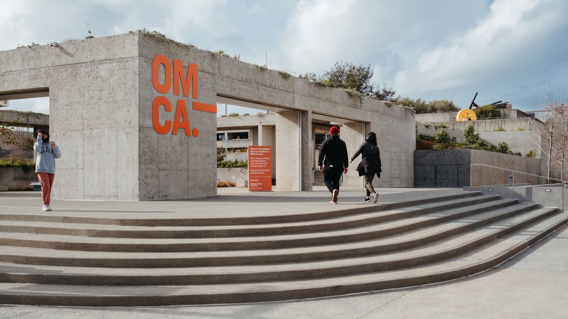 People walking into OMCA from the Lakesude entrance