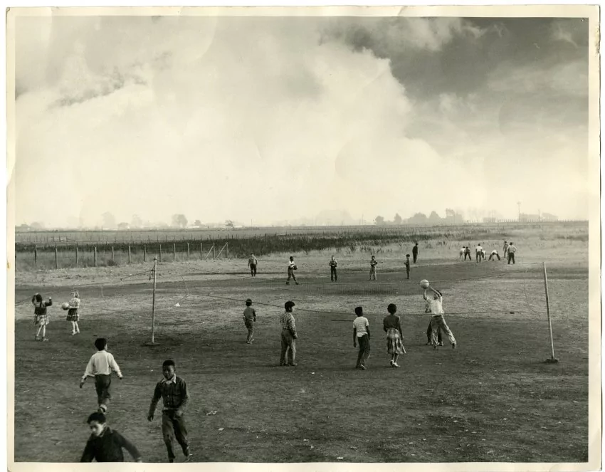 [Children playing volleyball on a dirt playground at Russell School] 	Circa 1950	Gelatin silver print Courtesy of Hayward Area Historical Society